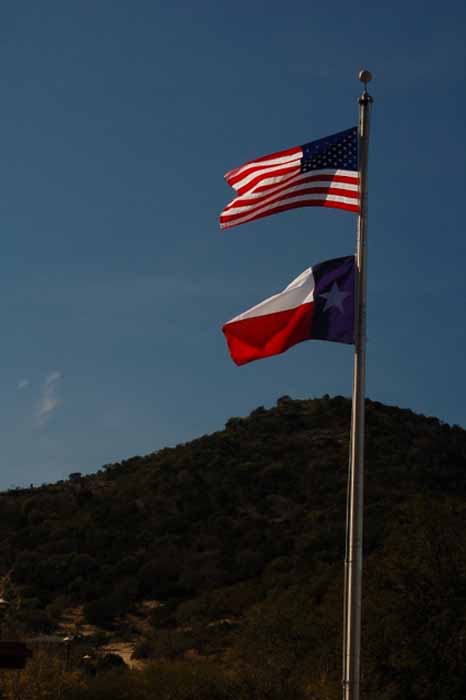 the Lone Star flag and American flag